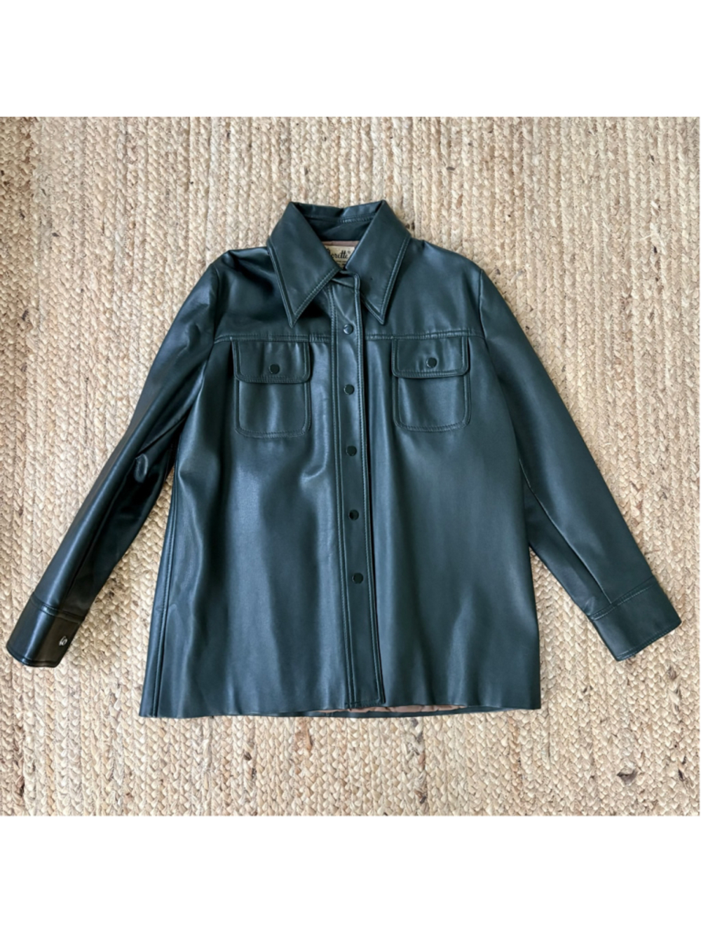 Vintage 60s Dorette dark green faux leather jacket. 

Features:
• snap front and